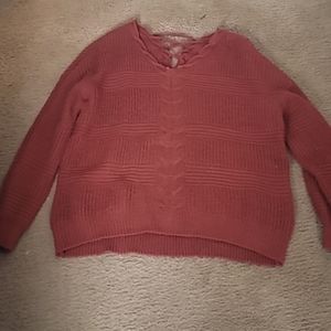 Cute sweater burnt orange color criss cross in back